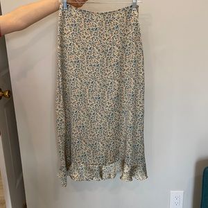 Floral midi slip skirt with buttons on the side. Brand new. Never worn.